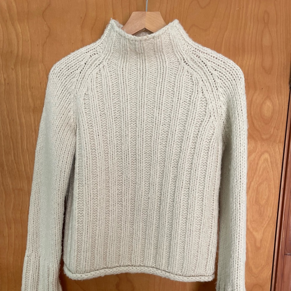 DKNY Sweater, white, Acrylic and wool Size Medium but fits like a small.